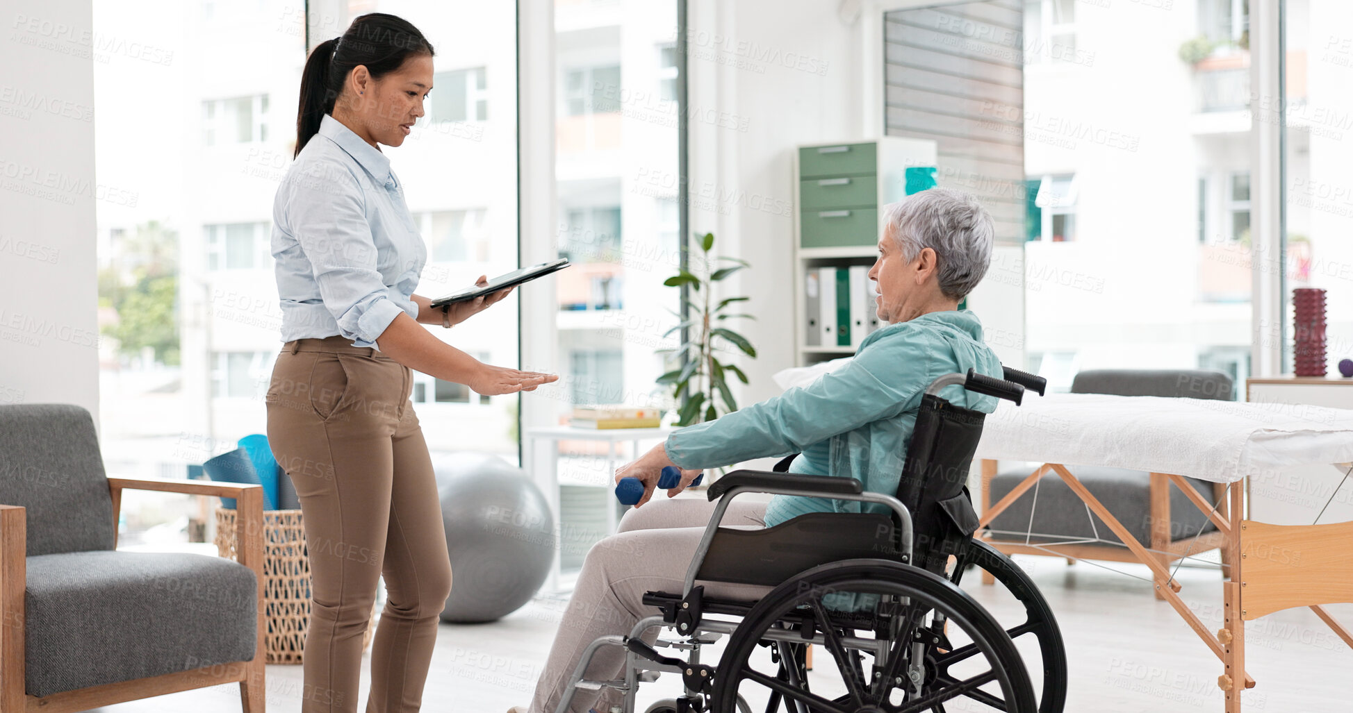 Buy stock photo Woman with disability, physiotherapy and dumbbell rehabilitation of healthcare assessment, test or checklist of healing progress. Physiotherapist, clipboard or consulting senior patient in wheelchair