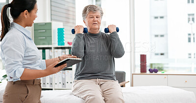 Physical therapy, senior patient with dumbbells and chiropractor with tablet, monitor progress and exercise. Help, support and women at clinic, weightlifting and elderly care with health and physio