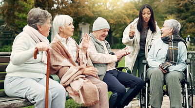 Friends, happy and senior people in park for bonding, conversation and quality time together outdoors. Friendship, retirement and elderly man and women with caregiver on bench for relaxing in nature