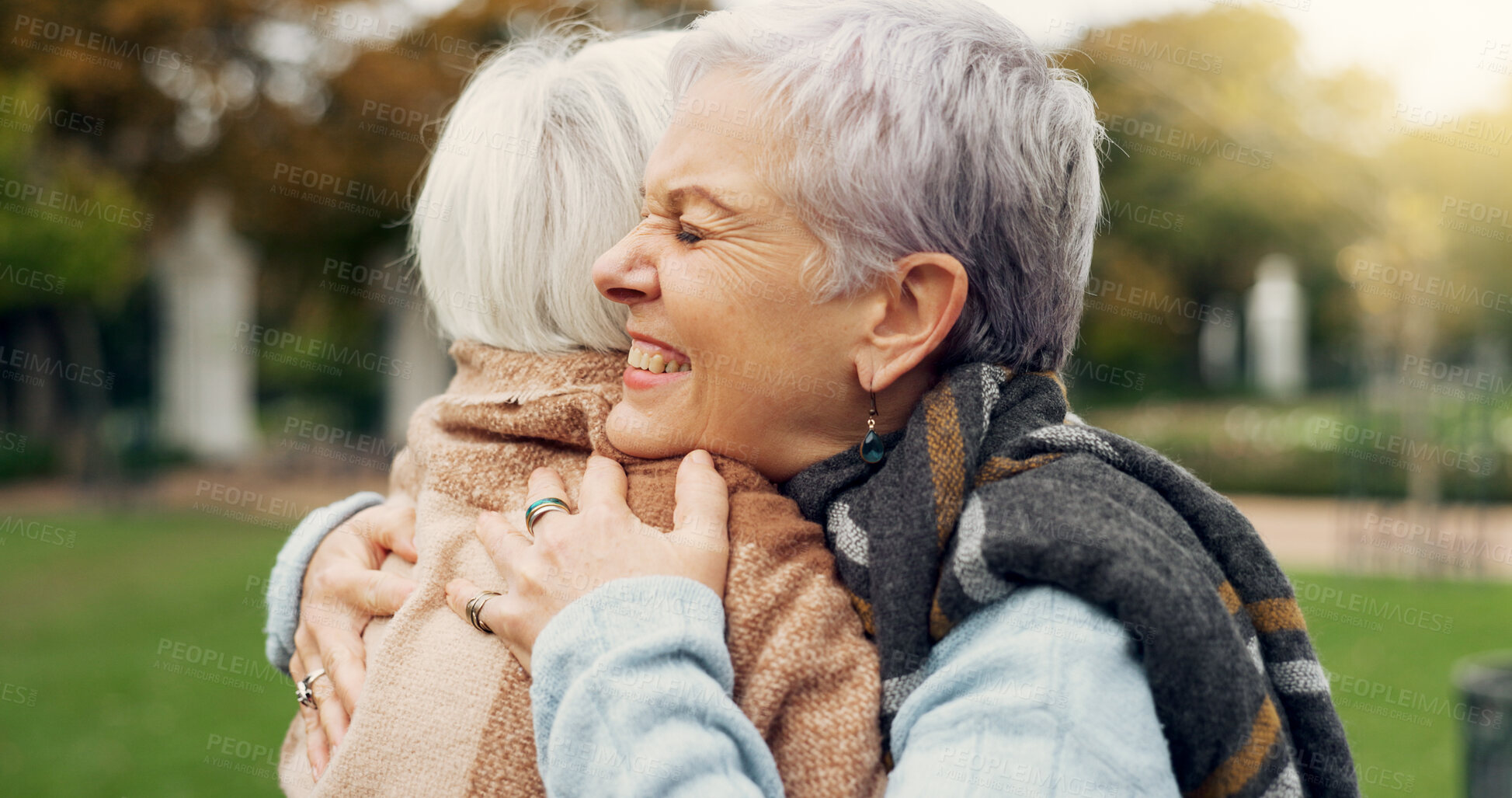 Buy stock photo Love, connection and elderly women hugging for affection, romance and bonding on an outdoor date. Nature, commitment and senior female couple in retirement with intimate moment in a garden or park.