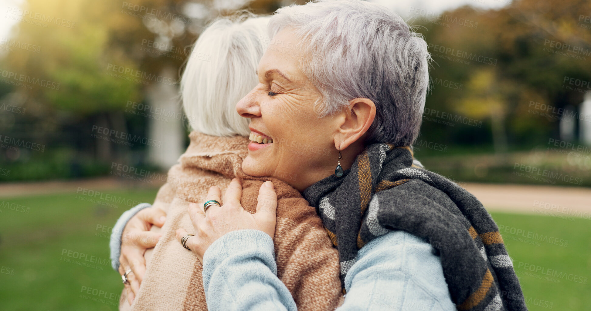 Buy stock photo Love, connection and elderly women hugging for affection, romance and bonding on an outdoor date. Nature, commitment and senior female couple in retirement with intimate moment in a garden or park.