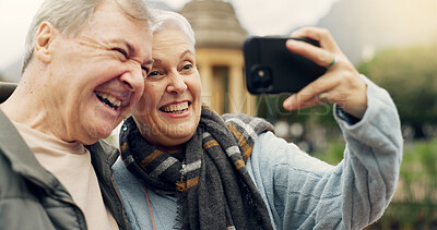 Selfie, smile and senior couple in a park, happy and laugh, relax and bond in nature on the weekend. Love, fun and elderly man and woman relax outdoor with profile picture while enjoying retirement