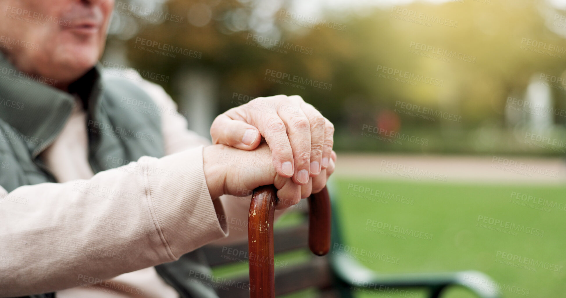 Buy stock photo Hands, cane and elderly man in nature for walking for fresh air, exercise or peace in a park. Environment, closeup and senior male person in retirement with a stick for support in outdoor garden.