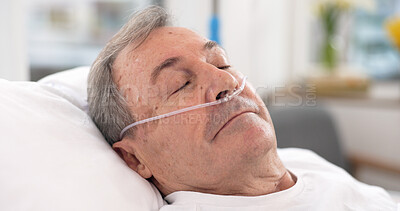Oxygen, hospital bed and senior man sleeping with ventilation and breathing tube support in a clinic. Elderly patient, medical care and emergency room with male person at a doctor for healthcare