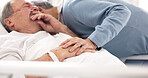 Hospital, sad or elderly couple, sick patient and hug for empathy, marriage bond and support for senior person. Healthcare crisis, whisper and man cough from medical problem, cancer or disease in bed