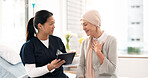 Tablet, nurse and woman with cancer patient, elderly and hospital consultation for wellness. Tech, happy and medical professional with sick senior person coughing for advice, healthcare or support