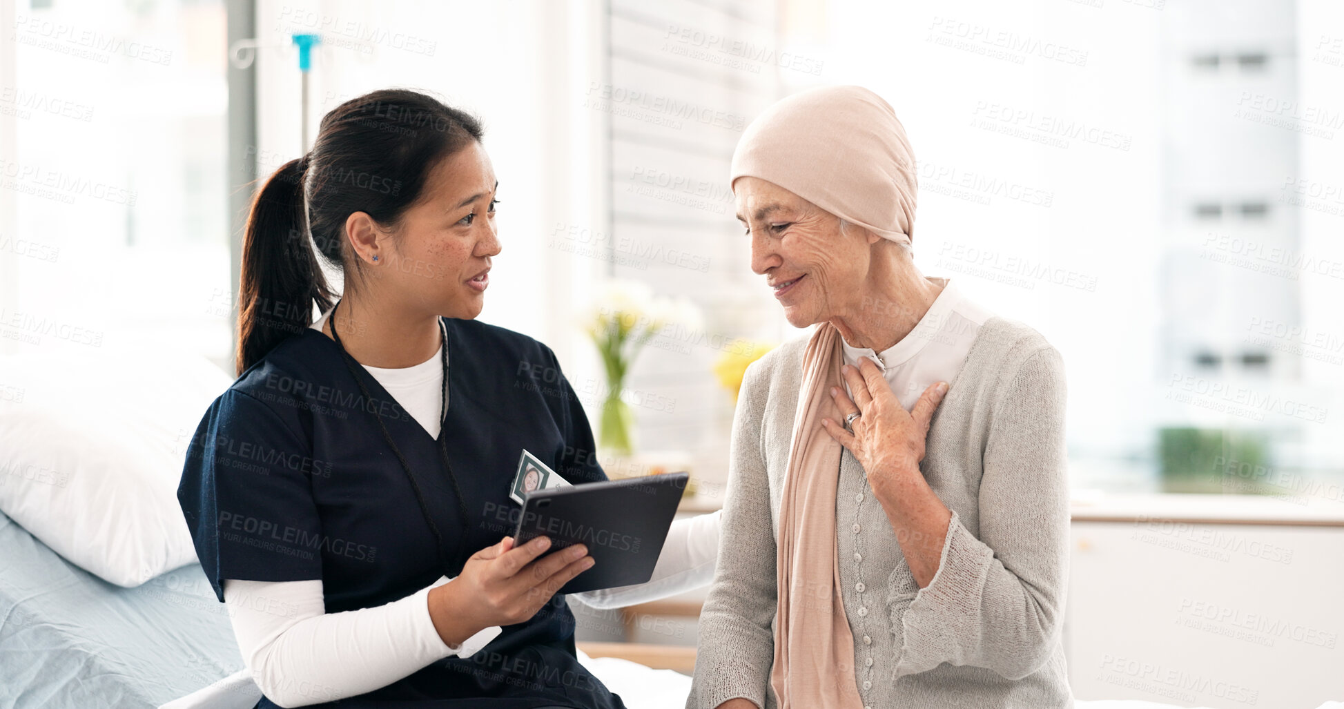 Buy stock photo Tablet, nurse and woman with cancer patient, elderly and hospital consultation for wellness. Tech, happy and medical professional with sick senior person coughing for advice, healthcare or support