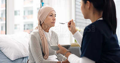 Cancer, nurse and help with old woman in hospital for food, medical and support. Healthcare, medicine and rehabilitation with senior patient and caregiver in clinic for nursing, empathy and oncology