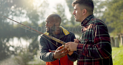 Fishing, lake and friends in nature talking on holiday, adventure and vacation together outdoors. Friendship, conversation and men with rods by river for sports hobby, activity and catching fish