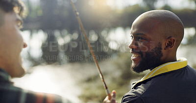 Fishing, laugh and friends in nature talking on holiday, adventure and vacation together outdoors. Friendship, lake and men in conversation with rod by river for sports hobby, activity and catch fish