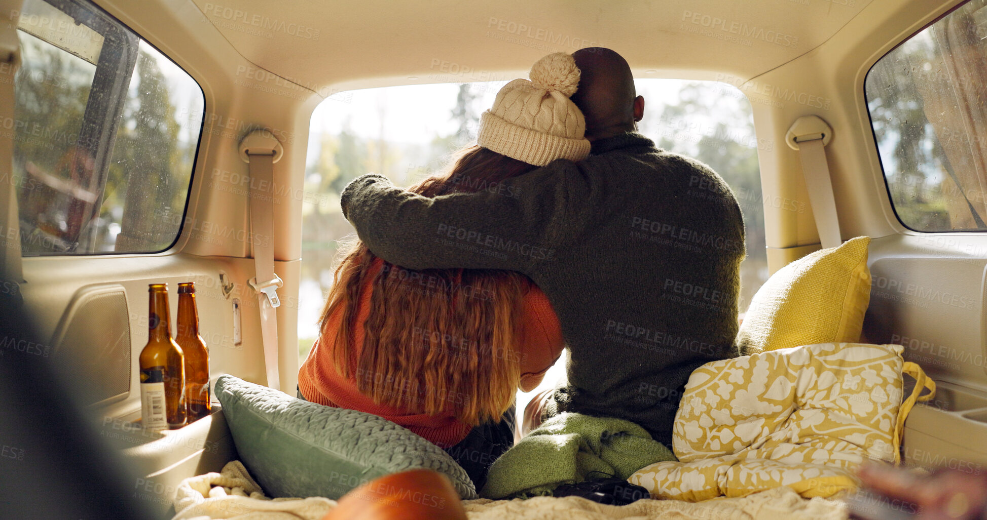 Buy stock photo Road trip, nature and couple hug in car from back, relax on adventure together with love and freedom. Camping journey, black man and woman embrace in van, romantic travel holiday at lake in camper.