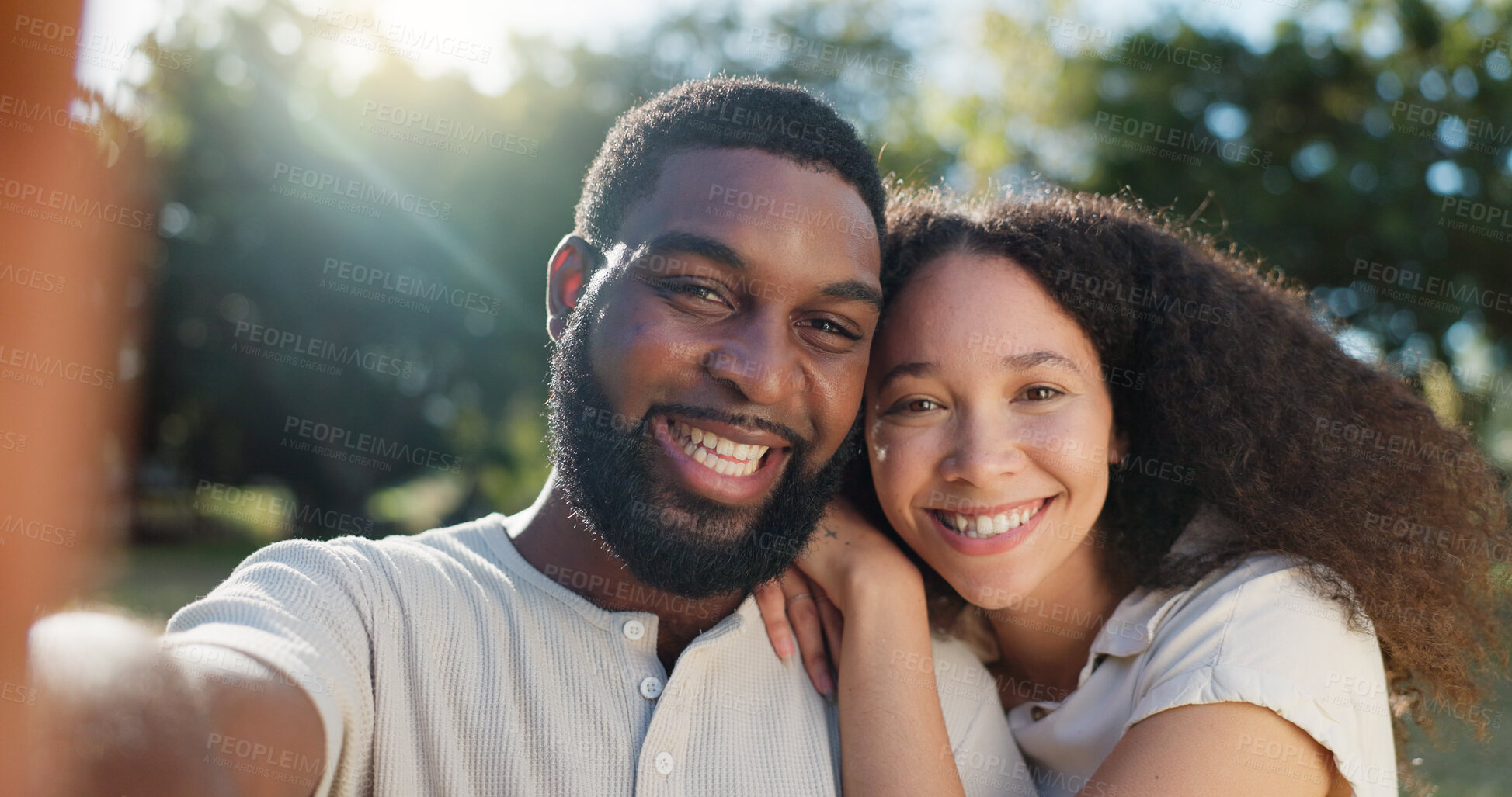 Buy stock photo Love, selfie and face of a couple in nature on a romantic date in a garden while on a holiday. Happy, smile and portrait of African young man and woman taking picture together in park on weekend trip