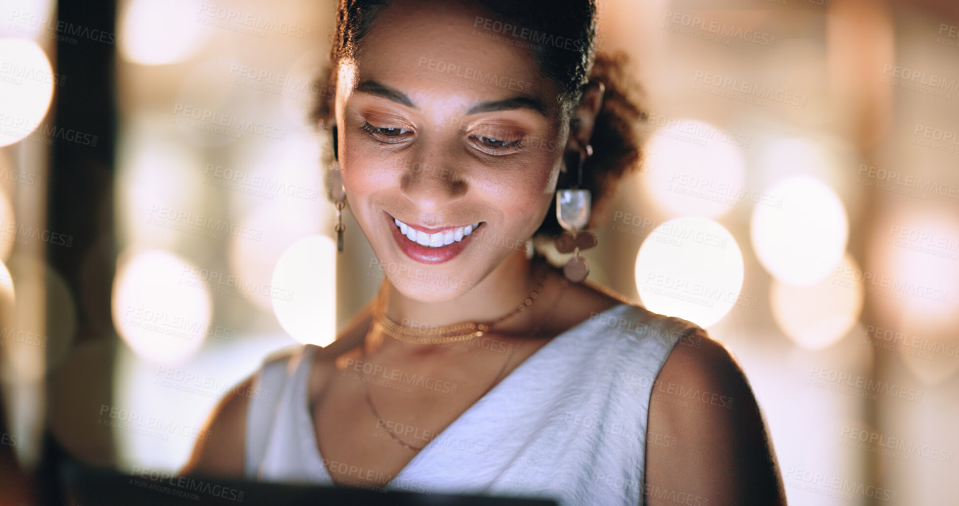 Buy stock photo Screen, office and face of black woman at night working online, reading internet website and do research. Business, technology and female worker networking on tablet, computer or laptop in workplace