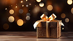 Birthday gift box with copyspace for holiday or Christmas present on bokeh background