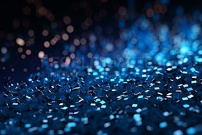 Glitter sparkle shiny bokeh background. Particles on dark background in space.