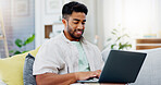 Laptop, laughing and man on couch watching funny video, live streaming or reading post on social media. Happy person relaxing on sofa with computer, internet and wifi in his apartment or living room