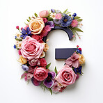 Colorful alphabet capital letter G made with flowers. Spring summer flower font.