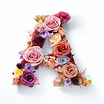 Colorful alphabet capital letter A made with flowers. Spring summer flower font.