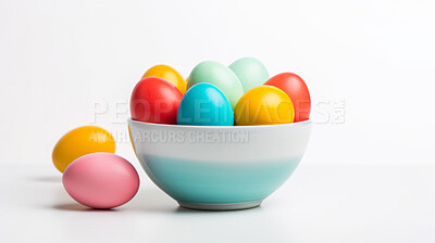 Buy stock photo Bowl of colorful easter eggs on white copyspace background. Chocolate candy in studio