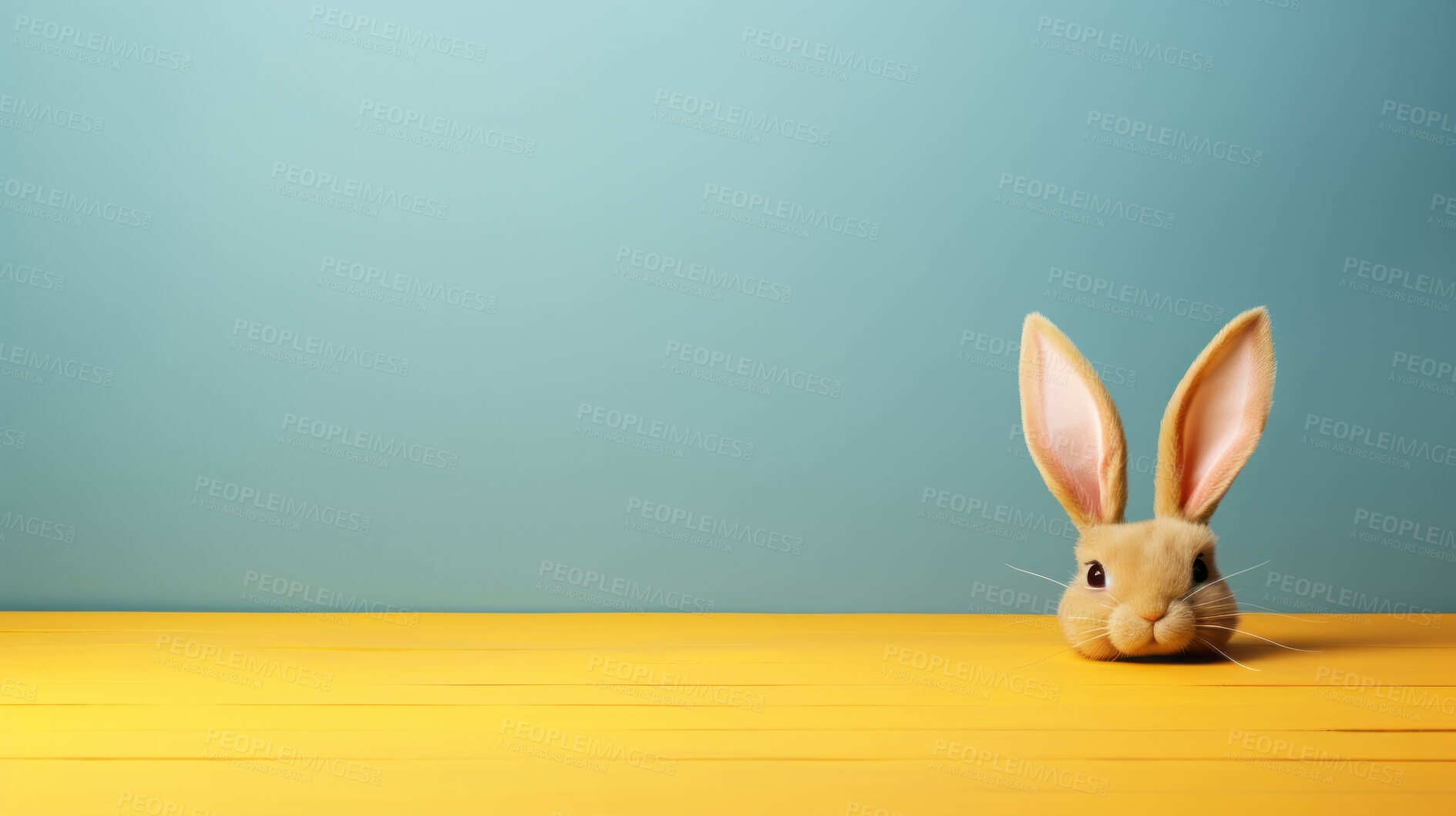 Buy stock photo Brown bunny head on blue copyspace background in studio. Festive Easter concept