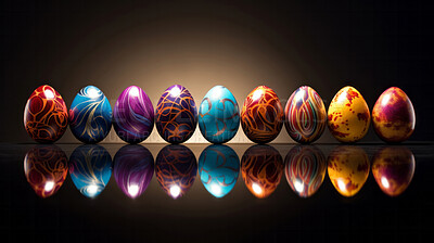 Row of colorful easter eggs on dark copyspace background. Chocolate candy in studio