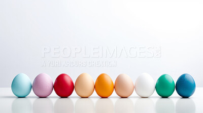 Buy stock photo Row of colorful easter eggs on white copyspace background. Chocolate candy in studio