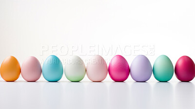 Buy stock photo Row of colorful easter eggs on white copyspace background. Chocolate candy in studio