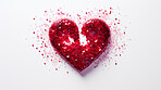 Glitter confetti heart on white copyspace background. Love, anniversary, relationship concept