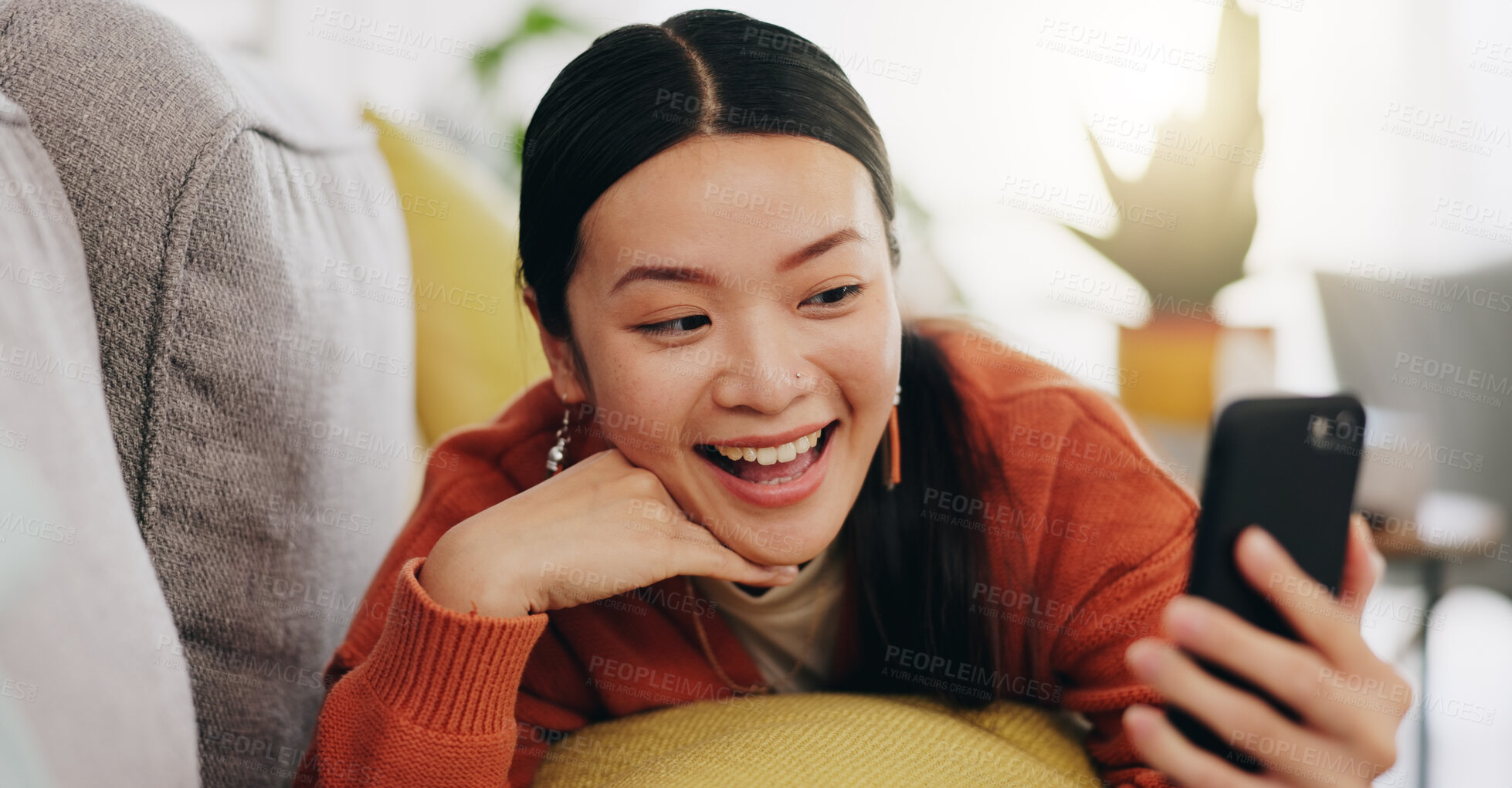 Buy stock photo Asian woman, selfie and lying on sofa with peace sign and love for profile picture, vlog or social media at home. Happy female relaxing with smile and hand signs for photo or online vlogging on couch