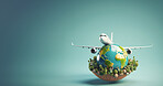 Airplane on earth globe on copyspace background. Sustainable fast travel concept