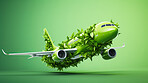 Airplane in leaves on green copyspace background. Sustainable travel, zero emissions travel concept