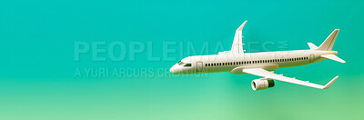 Airplane green and blue copyspace background. Sustainable travel, zero emissions and biofuel concept.