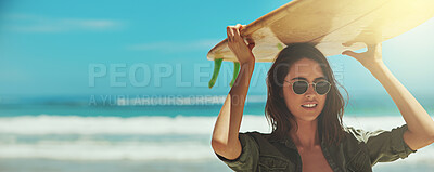 Buy stock photo Shot of a young and sexy female surfer on the beach