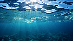 Close up of clear flowing water. Fresh spring mineral water for hydration and environment.