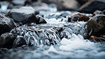 Fresh spring mineral water for hydration. Flowing liquid close up with copy-space.