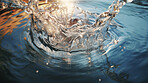 Close up of water splash. Fresh spring mineral water for hydration.