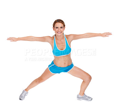 Buy stock photo A fit young woman doing stretches while isolated on a white background