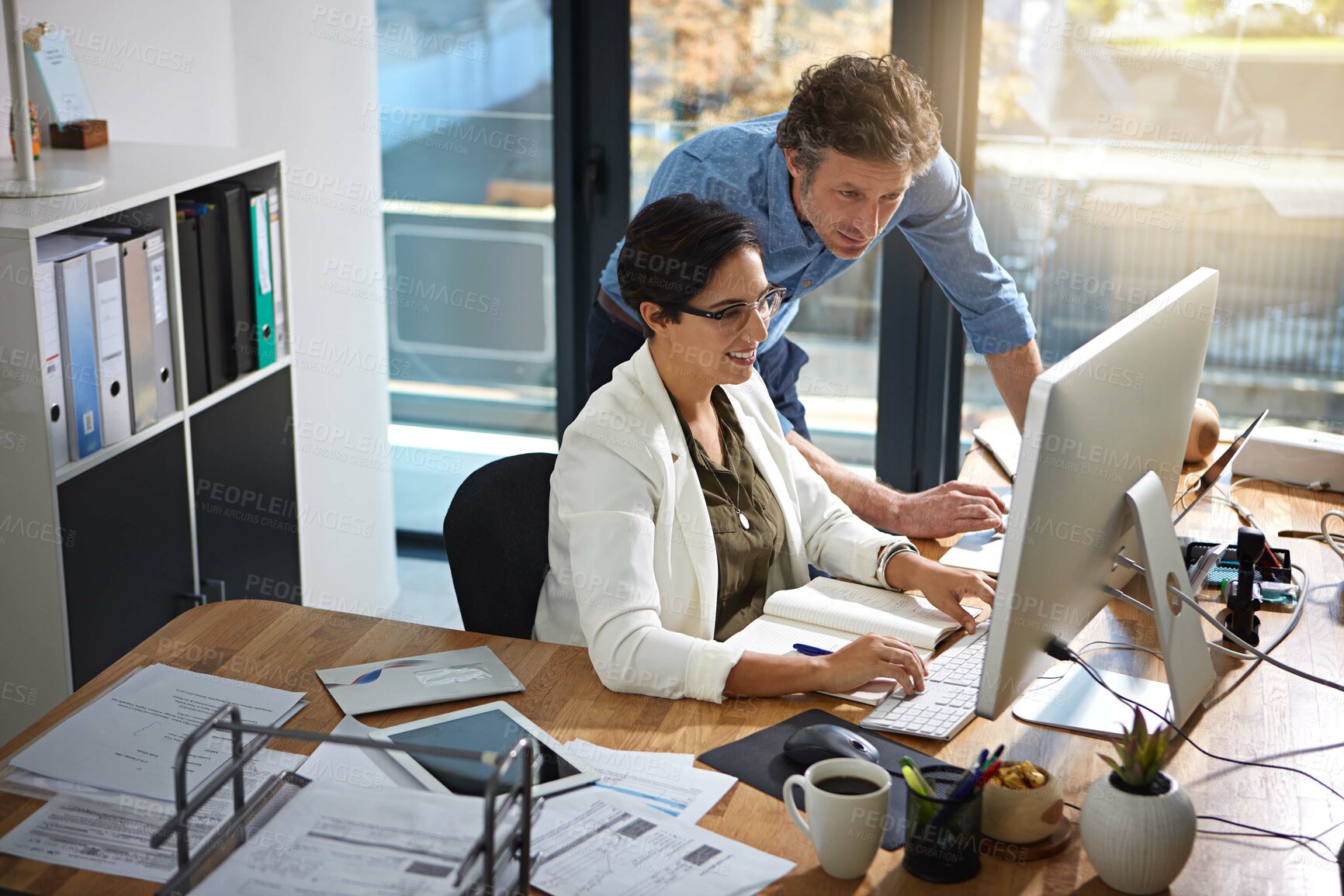 Buy stock photo Collaboration, teamwork and idea with business people at computer for digital marketing, web design and strategy. Coaching, training and review with employee for planning, global and vision in agency
