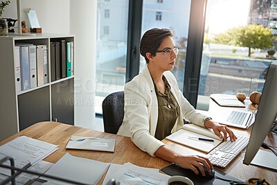 Buy stock photo Office, planning and business woman with computer typing online documents, website research and writing email. Corporate networking, and busy female employee at desk with focus, strategy and ideas