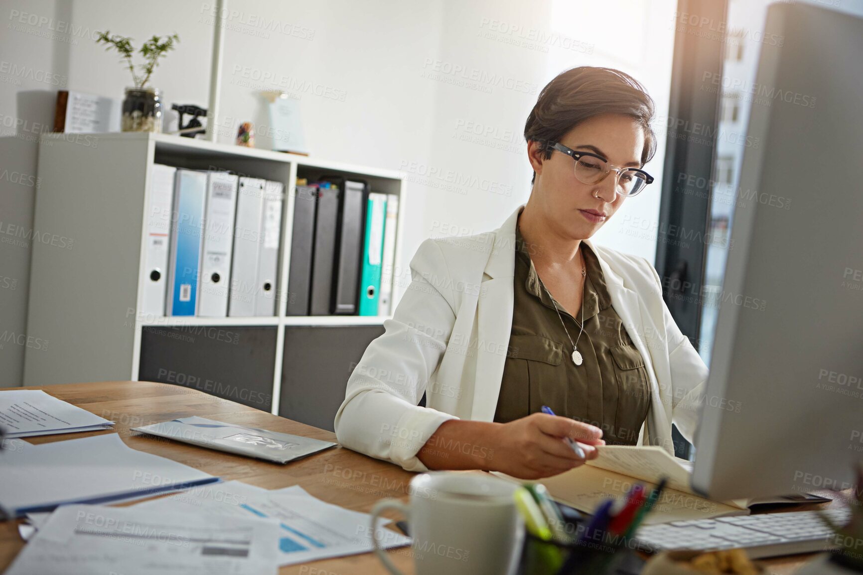 Buy stock photo Notebook, reading or planning and a business woman at work in her office with a mindset of future growth. Research, writing and book with a female employee working at her desk for development