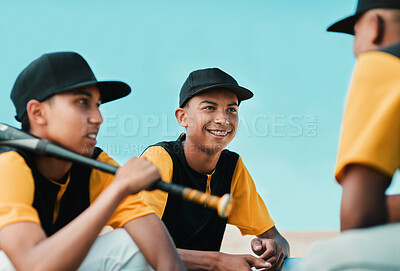 Buy stock photo Cropped shot of baseball players chatting while sitting together