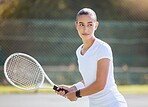 Tennis, sport and woman holding her racket and ready to play on court outdoor. Fitness and training female athlete playing in professional sports competition. Enjoy active game, exercise or workout