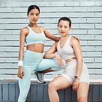 Fitness, portrait and women training in the city for motivation, body goal and collaboration together. Young athlete friends doing an outdoor cardio, exercise and workout for a healthy lifestyle