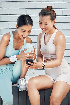 Buy stock photo Friends, fitness and phone with laughing women on internet sharing funny comic app on social media. Female runner and athlete with smartphone on training, cardio workout and exercise break outdoor
