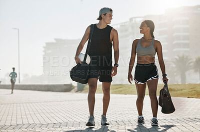 Buy stock photo Sports, personal trainer and woman in fitness walking with a soccer ball for cardio exercise, workout and training session. Smile, wellness and happy couple enjoy a healthy city lifestyle in summer