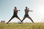 Fitness, couple and arm stretching in a park to warm up for an outdoor workout or soccer training. Sports, motivation and healthy friend athletes doing an exercise before soccer practice in nature.