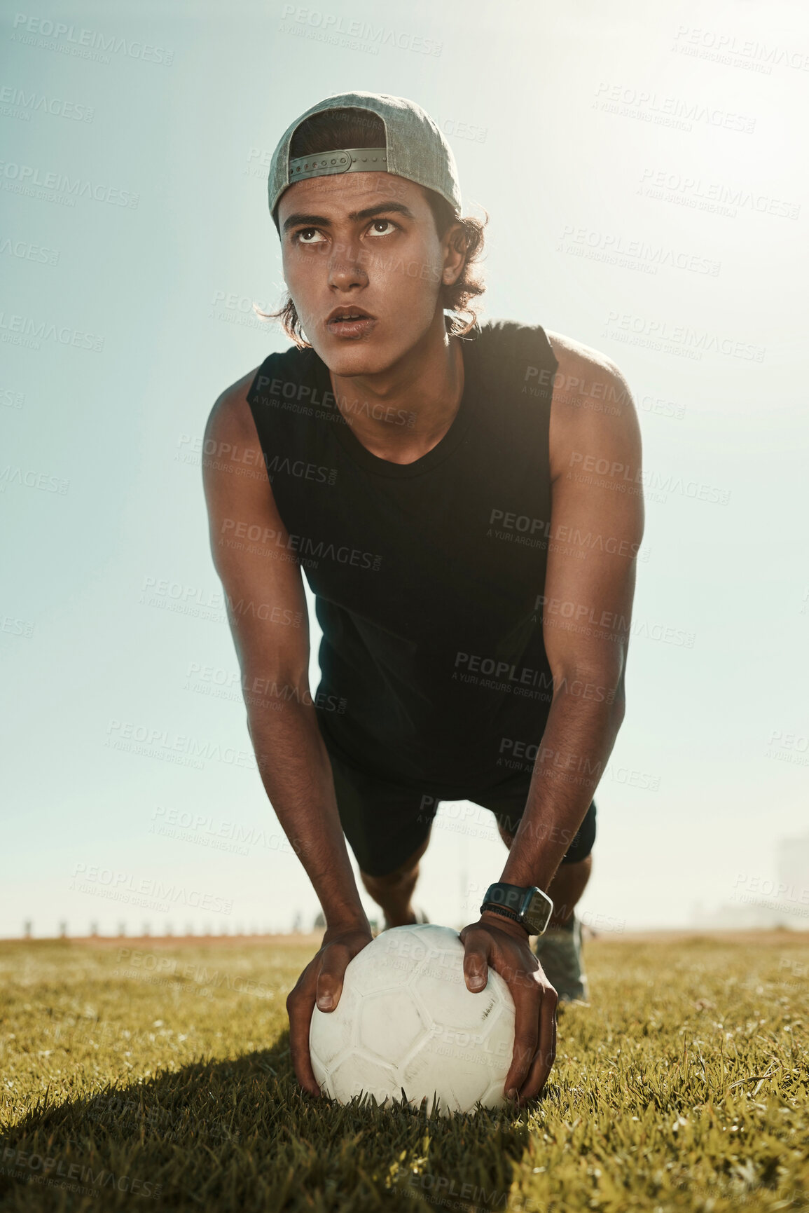 Buy stock photo Grass field, fitness workout and soccer core training exercise on an outdoor football field for body or cardiovascular health. Soccer player, focus young man and athlete warmup in Brazil summer sun