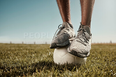 Buy stock photo Football, feet and balance on a soccer ball outdoor in nature on grass ready for exercise. Fitness, training and sport workout balancing for sports cardio and healthy athlete practice in the summer