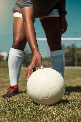 Buy stock photo Hand, placing and soccer ball on field for free kick, penalty or goal in game, training or match. Woman, football and grass outdoor in summer for fitness, exercise and workout in sports for wellness