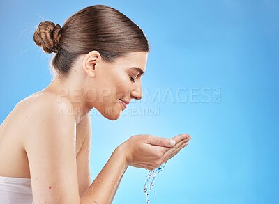 Buy stock photo Water splash and face of woman skincare in studio with mockup advertising or marketing space for skin care wellness or beauty cleaning. Young model with facial wash skin care morning and water drops